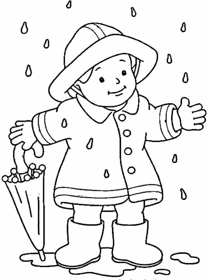 Dibujo de Niño Sosteniendo un Paraguas de Pie Bajo la Lluvia en otoño para Colorear