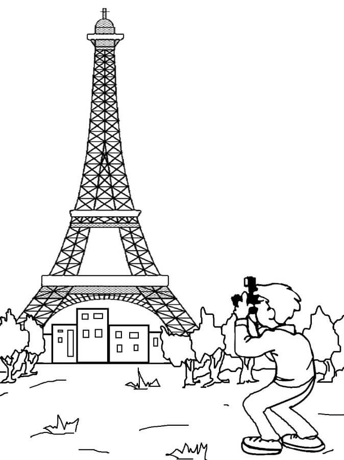Dibujo de Fotografo Tomando Fotos de la Torre Eiffel para Colorear